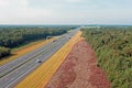 Traffic on the highway A1 on the Veluwe in the Netherlands Royalty Free Stock Photo