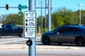 Traffic intersection pedestrian crosswalk crossing sign with signal descriptions