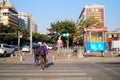 Traffic intersection set cartoons and humorous language to persuade pedestrians not to run a red light