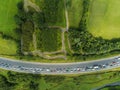 Traffic jam, Aerial top view, Two lines full of cars. Small park by the road