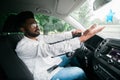 Traffic jam - angry stressed indian businessman driving car Royalty Free Stock Photo