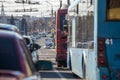 Traffic jam in autumn russian city at day light - selective focus view from inside