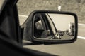 Traffic jam in car mirror in sepia tone Royalty Free Stock Photo