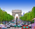 Traffic jam with cars in Paris city, France. view of Arc de Triomphe and Champs Elysees boulevard Royalty Free Stock Photo