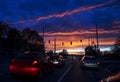 Traffic jam in city at colorful cloudy sky Royalty Free Stock Photo