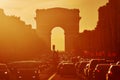 Traffic jam with lots of vehices in Paris on Champs-Elysees street with Triumphal Arch Royalty Free Stock Photo