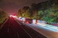 Traffic jam on the motorway , trucks use the motorway exit