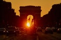 Traffic jam in Paris on Champs-Elysees street with Triumphal Arch Royalty Free Stock Photo