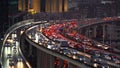 Traffic jam in the rush hour on highway. Cars on bridges and roads in Shanghai Downtown, China at night Royalty Free Stock Photo