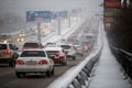 Traffic jam in Vladivostok during a snowfall.
