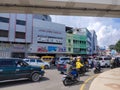 Traffic jams on the streets of Palembang city with miscellaneous of building backgrounds