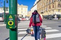 traffic light activation button for pedestrians crossing the crosswalk in Rome, Italy.