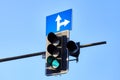 Traffic light against the blue sky Royalty Free Stock Photo