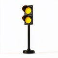 A traffic light on a black pole with a white background Royalty Free Stock Photo