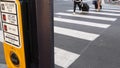 Traffic light button on pedestrian crosswalk, people have to push and wait. Traffic rules and regulations for public safety in USA Royalty Free Stock Photo