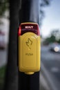 traffic light button with red light and wait stop signal, yellow box Royalty Free Stock Photo