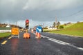 Traffic light counting down at road construction site Royalty Free Stock Photo