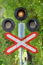 Traffic light before crossing the railway Royalty Free Stock Photo