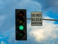 Traffic light, do not block intersection. Seen at Los Angeles Highway, United States.