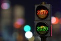 Traffic light with green light 2020 in the night city, 3D rendering Royalty Free Stock Photo