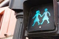 Traffic light with green women figures