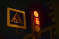 Traffic light at the intersection at night for pedestrians and cars Royalty Free Stock Photo
