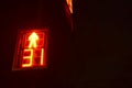 Traffic light at the intersection at night for pedestrians and cars Royalty Free Stock Photo