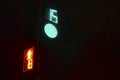 Traffic light at the intersection at night for pedestrians and cars Royalty Free Stock Photo