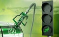 Traffic light with leaf symbol and biofuel tank. Carbon neutrality concept..