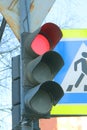 Traffic light for pedestrians with a red light on a pillar in the city Royalty Free Stock Photo