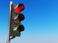 Traffic light with red color on blue sky background. Stop concept. Royalty Free Stock Photo