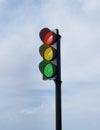Traffic light with red, yellow and green colors on isolated on blue sky backgroundtraffic light with red, yellow and green colors Royalty Free Stock Photo