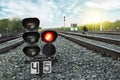 Traffic light shows red signal on railway. Railway station. Travel concept. Royalty Free Stock Photo