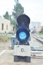 Traffic light shows red signal on railway. Royalty Free Stock Photo