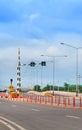 Traffic Light Signal, Road Markings and Pass Either Side , Dangerous Obstruction Warning Sign countryside Highway in Thailand Royalty Free Stock Photo