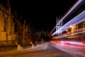 Traffic light trails past Oxford University college buildings on High Street Royalty Free Stock Photo