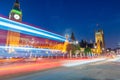 Traffic light trails under Big Ben on a beautiful summer night - Royalty Free Stock Photo