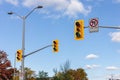 Traffic lights against blue sky on street of Ottawa city in Canada in autumn Royalty Free Stock Photo