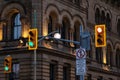 Traffic lights against historical building in downtown Ottawa, Canada at night Royalty Free Stock Photo