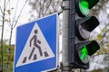 Traffic lights. green color and pedestrian crossing sign in a city Royalty Free Stock Photo