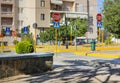 traffic lights, road stop signs, pedestrian crossing signs and yellow markings of bardures on the street of the city Royalty Free Stock Photo