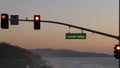 Traffic lights, pacific coast highway, California. Road trip along ocean in dusk Royalty Free Stock Photo