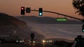 Traffic lights, pacific coast highway, California. Road trip along ocean in dusk Royalty Free Stock Photo