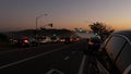 Traffic lights, pacific coast highway, California. Road trip along ocean in dusk Royalty Free Stock Photo