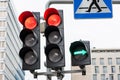 Traffic lights and Pedestrian Crossing road sign in city Royalty Free Stock Photo