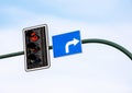 Traffic lights red arrow, single right turn sign showing a new direction, red light signal object closeup, nobody, clear sky