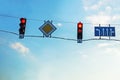 traffic lights with red light on the highway against the background of the evening sky. Royalty Free Stock Photo