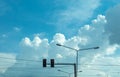 Traffic lights and Street lamps with bright blue sky. Royalty Free Stock Photo