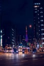 Traffic on the major city road in Tokyo with Tokyo Tower in the distance