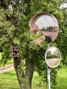 Traffic mirrors in a Swedish village reflecting the village